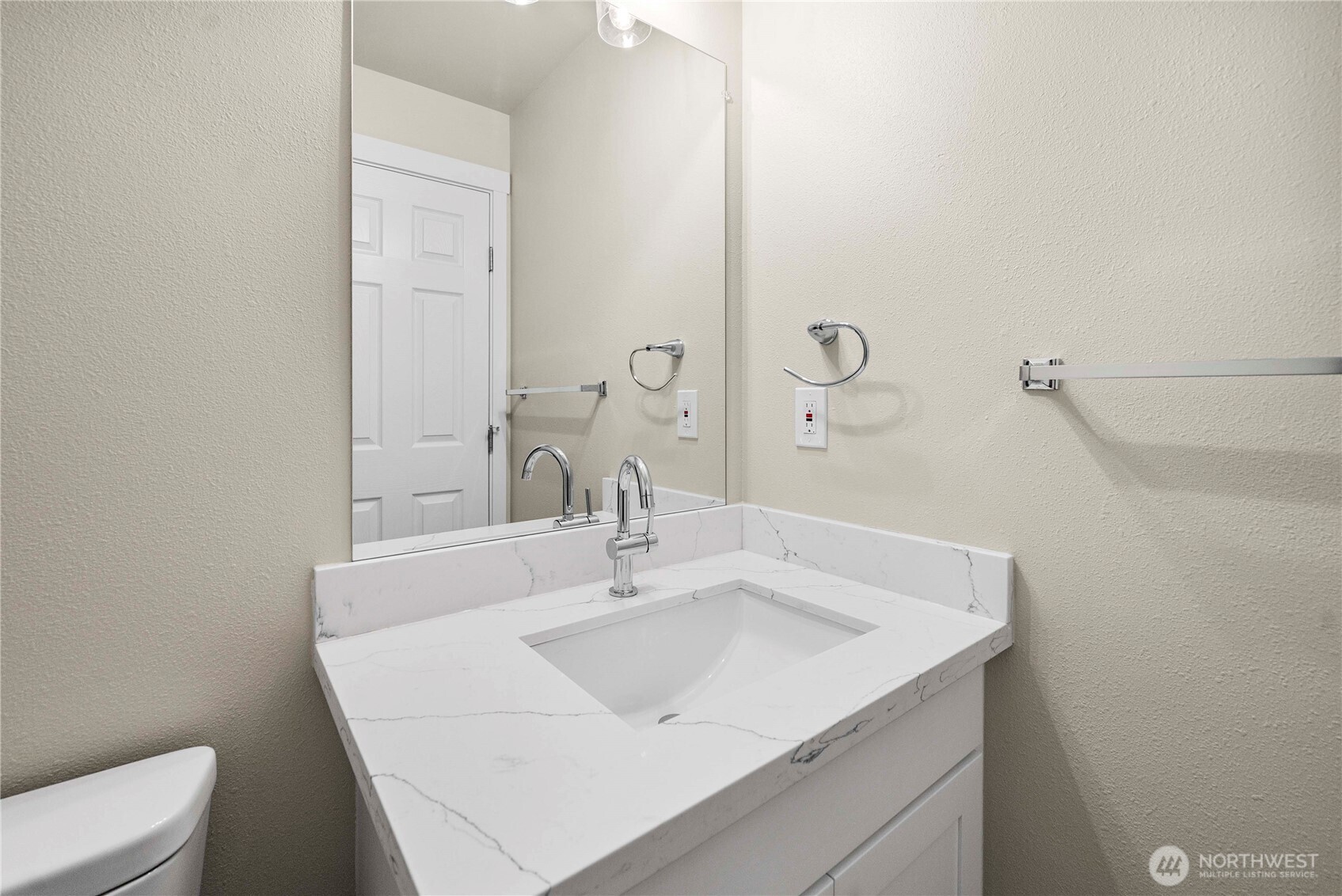 4125 South 220th Place, Unit 26 Kent, WA 98032 - Photo 33 of 39 a bathroom with a sink and a toilet