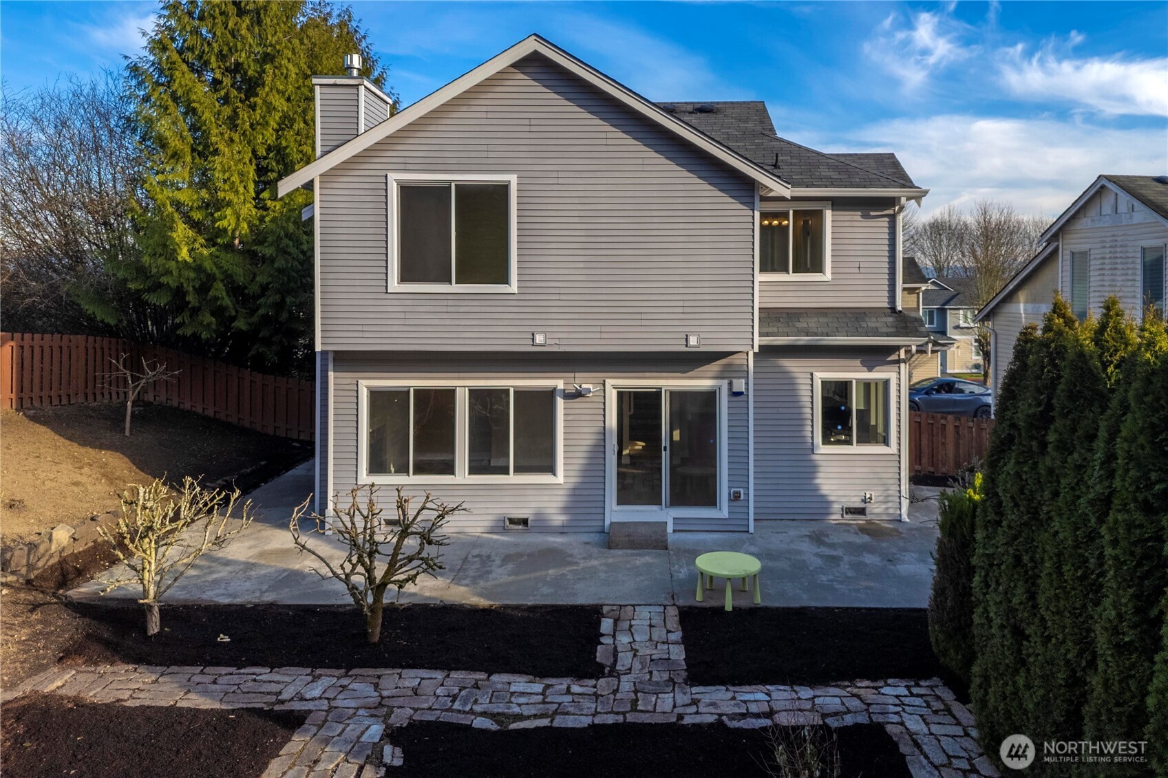 4125 South 220th Place, Unit 26 Kent, WA 98032 - Photo 34 of 39 a front view of a house with a yard