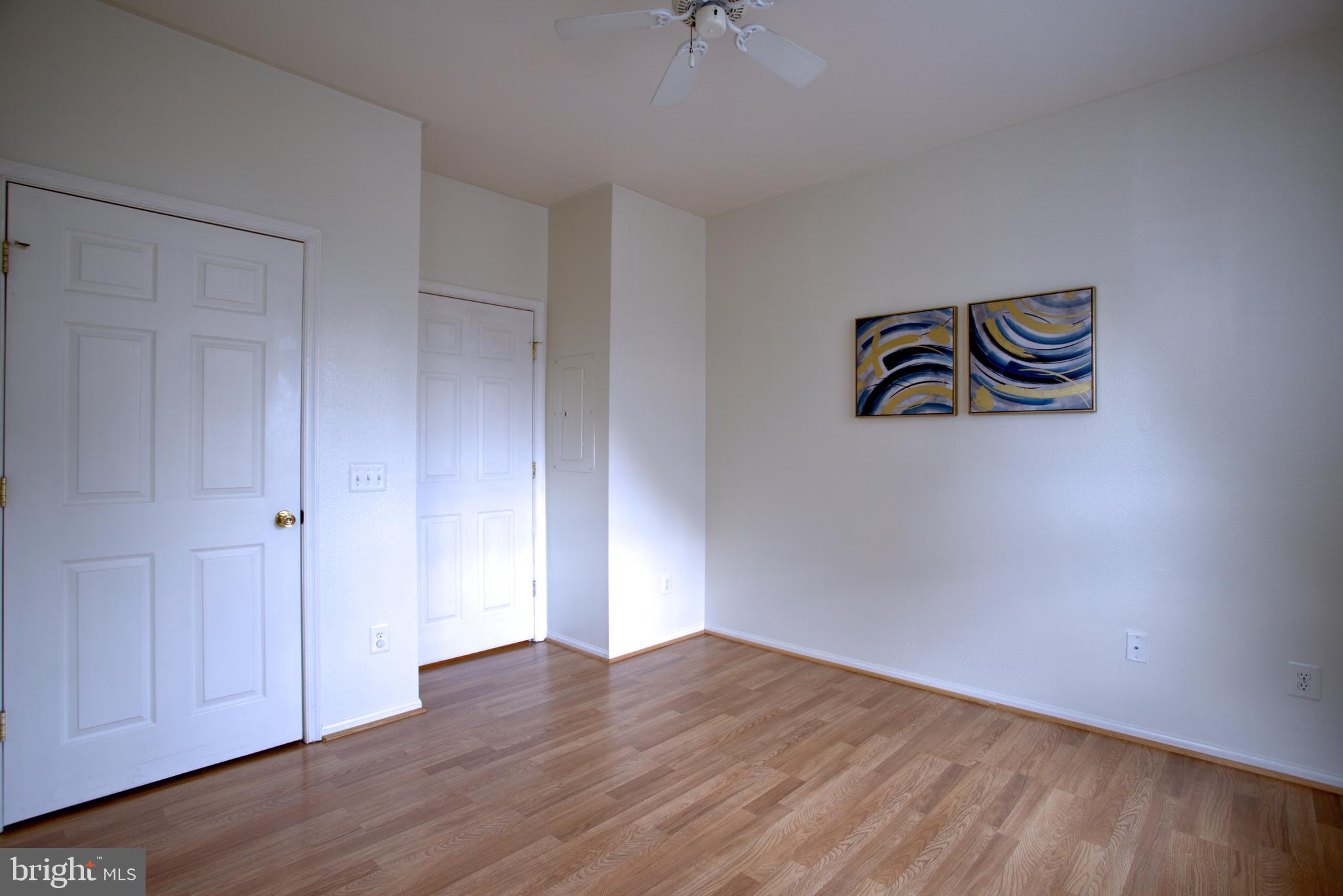 1570 Spring Gate Dr., Unit 7215 McLean, VA 22102 - Photo 11 of 30 a view of a room with wooden floor