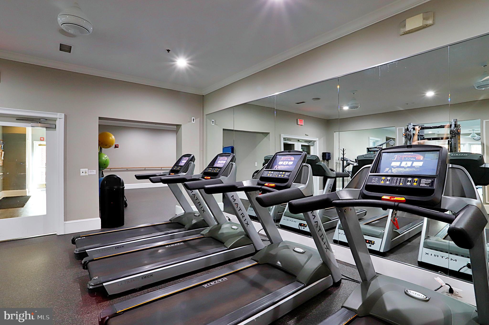 1570 Spring Gate Dr., Unit 7215 McLean, VA 22102 - Photo 20 of 30 a view of a room with gym equipment