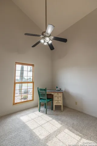 a bathroom with a sink toilet and mirror