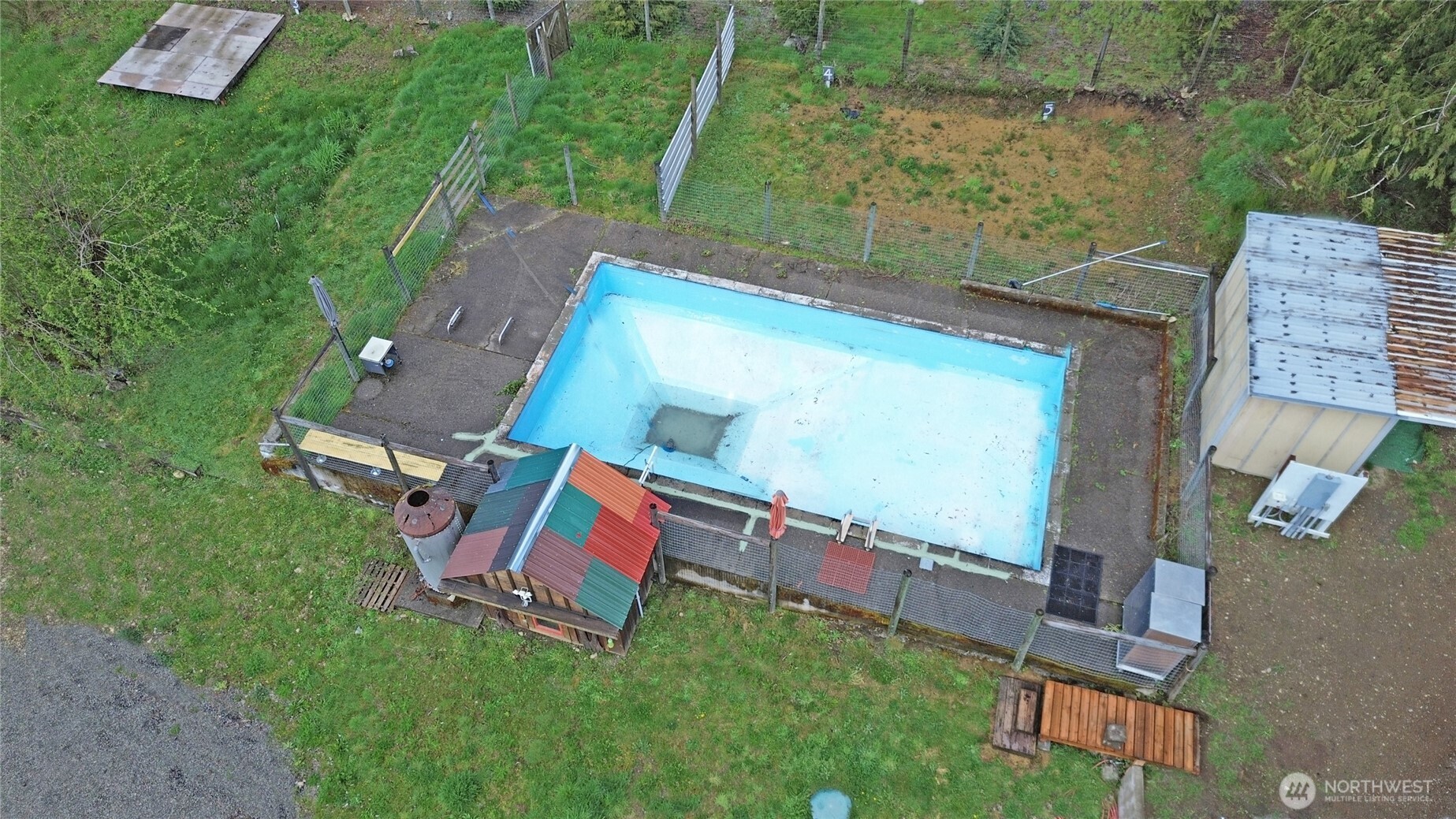 113 Leroy Road Randle, WA 98377 - Photo 6 of 40 an aerial view of a house with a yard basket ball court and outdoor seating