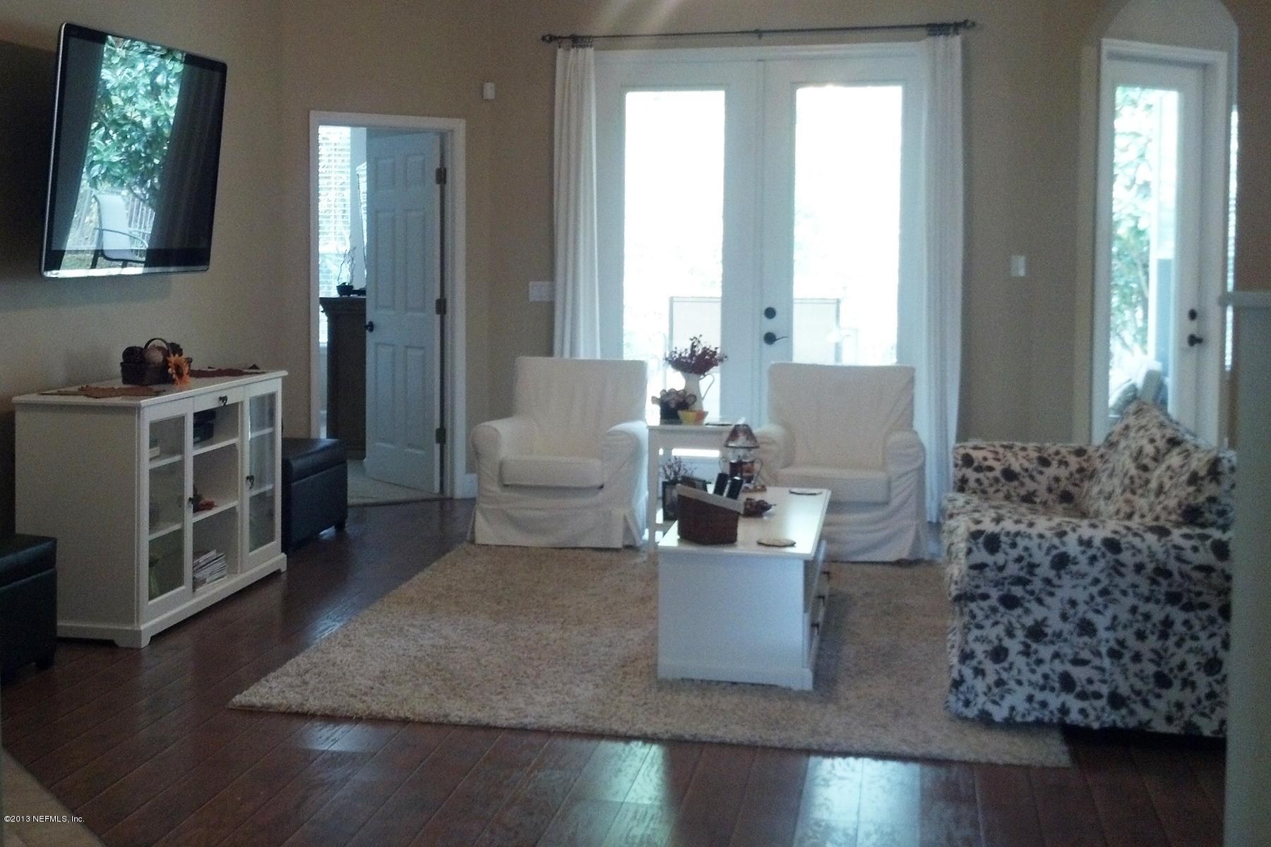 3116 East Banister Road St. Augustine, FL 32092 - Photo 8 of 18 Great Room; Gas Fireplace, Wood Flooring