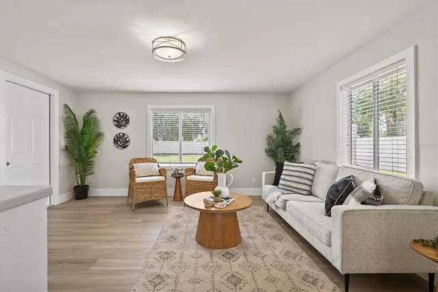a living room with furniture and window
