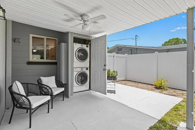 a view of a house with a yard and garage