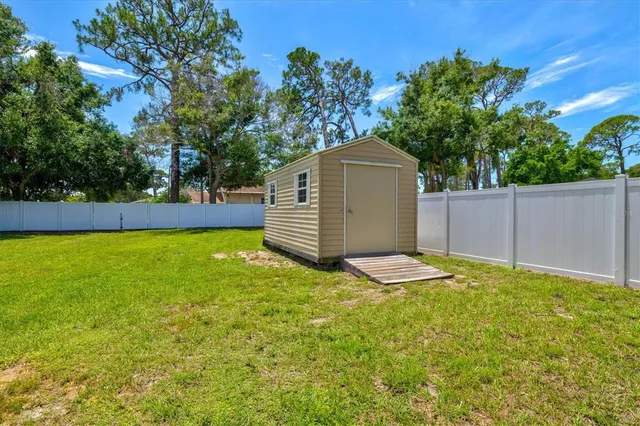 a view of a building with sitting area