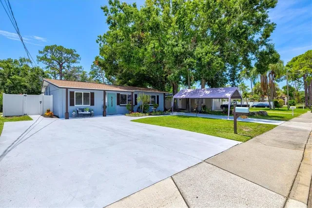 a view of a building with sitting area