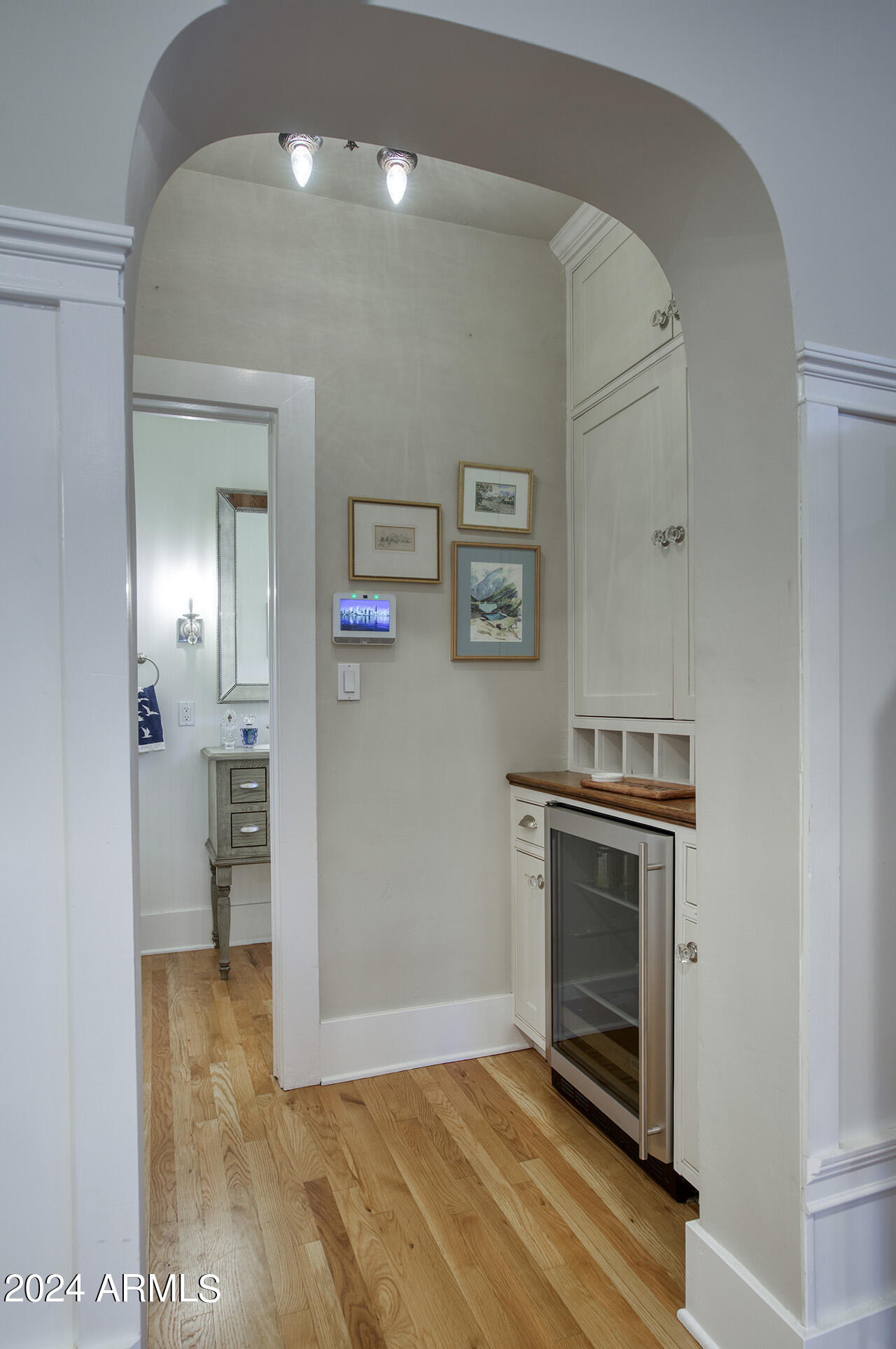 324 West Monte Vista Road Phoenix, AZ 85003 - Photo 15 of 39 a view of a livingroom with wooden floor and a fireplace