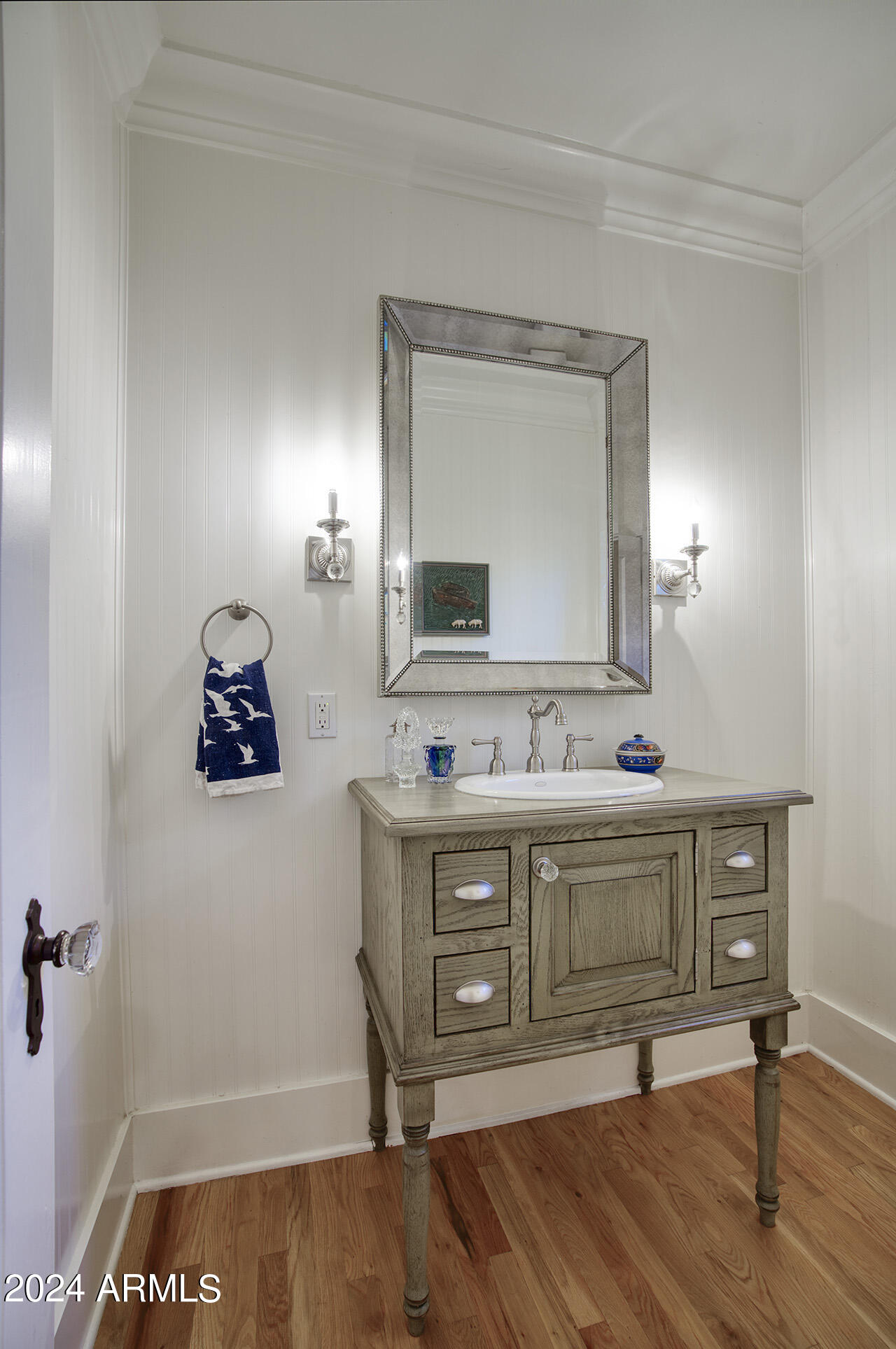 324 West Monte Vista Road Phoenix, AZ 85003 - Photo 16 of 39 a living room with a bed and a mirror on dresser