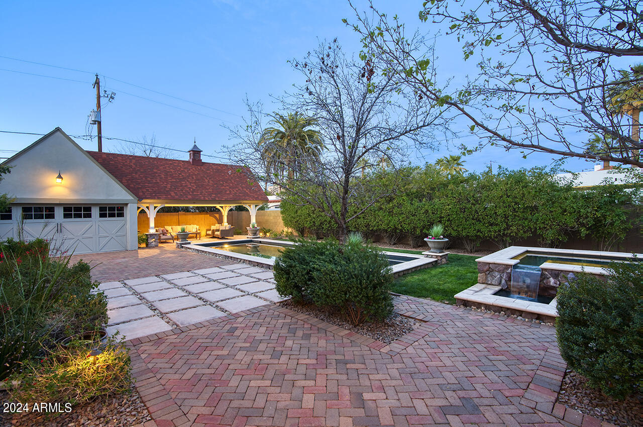 324 West Monte Vista Road Phoenix, AZ 85003 - Photo 28 of 39 a front view of a house with a yard