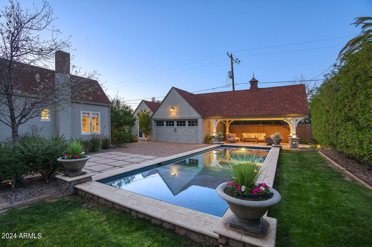 324 West Monte Vista Road Phoenix, AZ 85003 - Photo 31 of 39 a house with lots of trees in front of it
