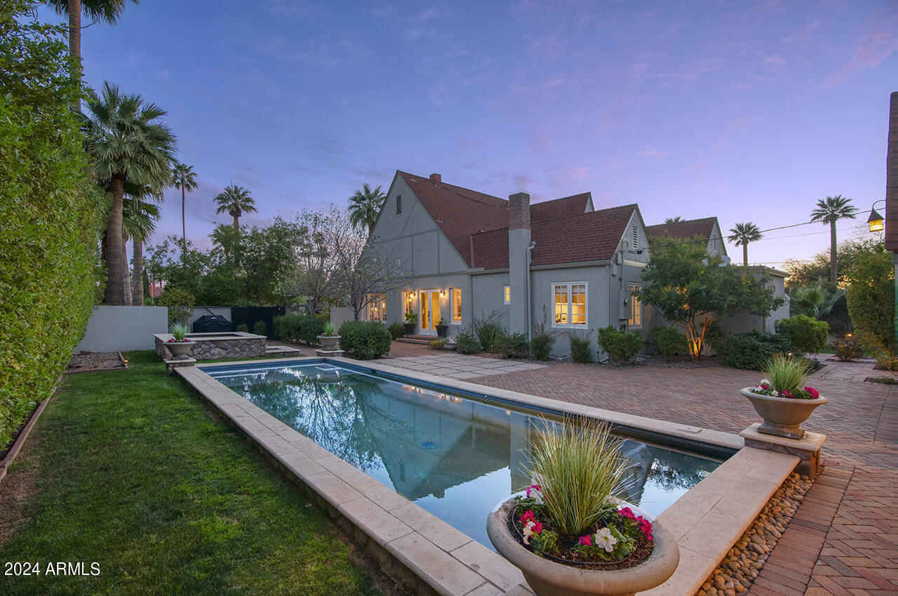 324 West Monte Vista Road Phoenix, AZ 85003 - Photo 33 of 39 a view of a swimming pool with a patio