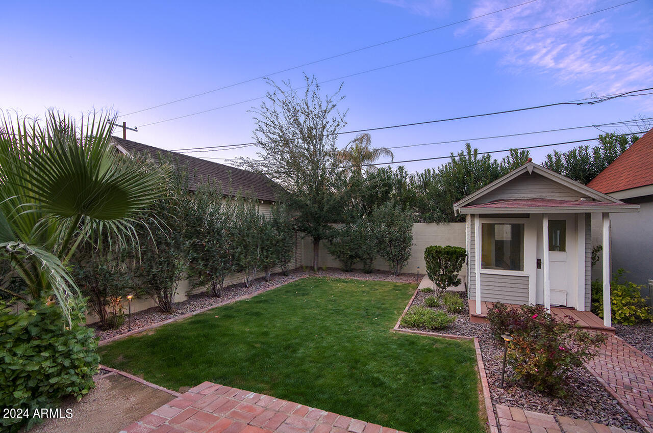 324 West Monte Vista Road Phoenix, AZ 85003 - Photo 36 of 39 a front view of a house with a yard