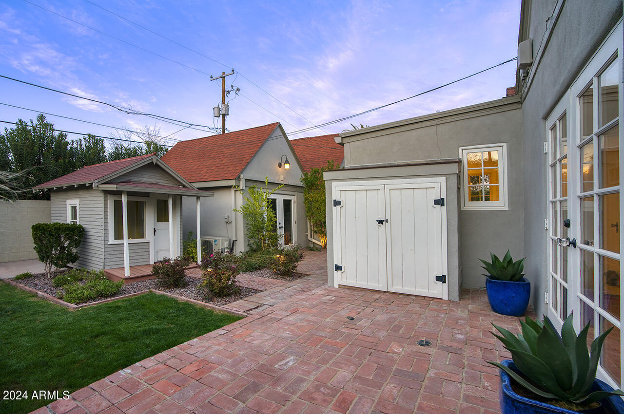324 West Monte Vista Road Phoenix, AZ 85003 - Photo 37 of 39 a front view of a house with a yard