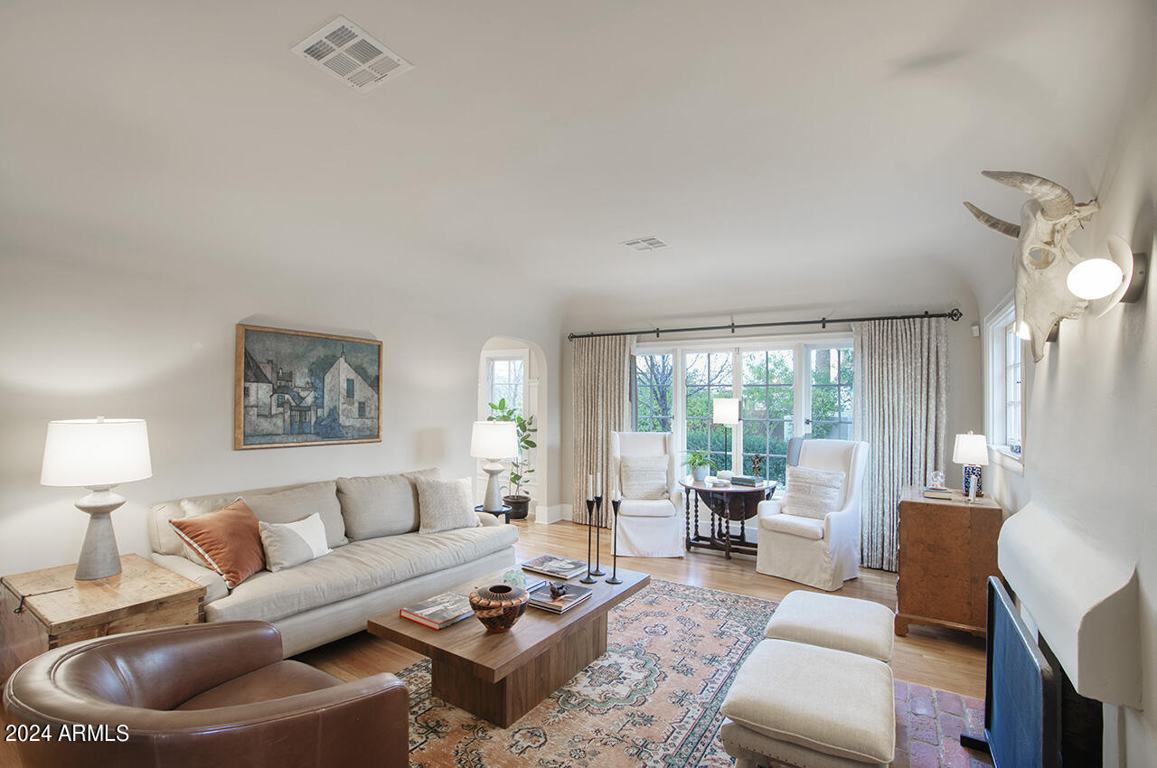 324 West Monte Vista Road Phoenix, AZ 85003 - Photo 6 of 39 a living room with furniture and a large window