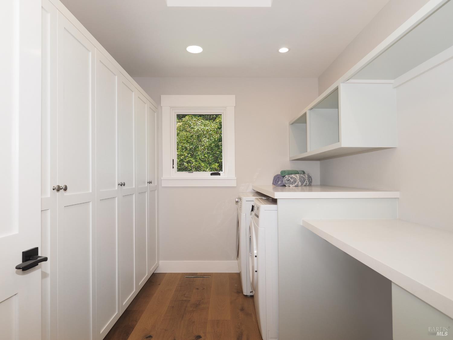 1575 Fox Ridge Road Geyserville, CA 95441 - Photo 34 of 57 Spacious laundry room with floor to ceiling storage.
