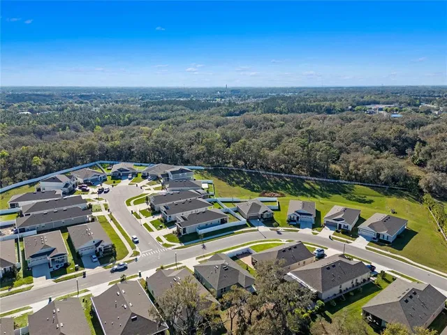 a view of a swimming pool with seating area