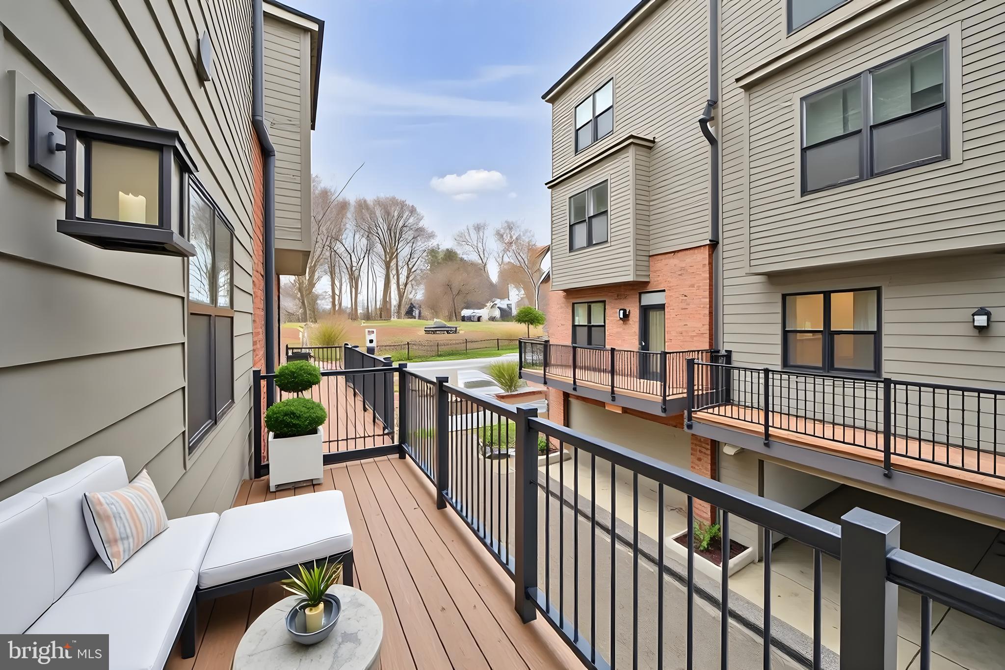 5420 Goshawk Alley Bethesda, MD 20816 - Photo 12 of 57 a view of a balcony with furniture