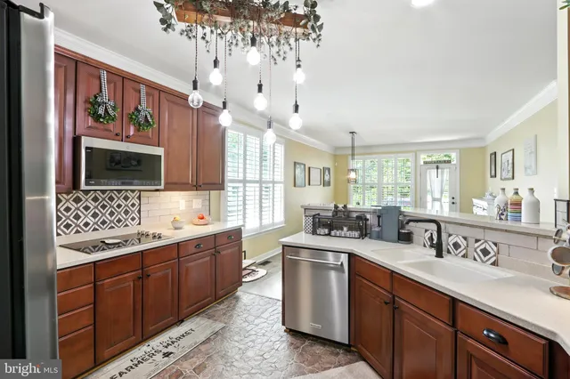 a bathroom with a sink double vanity granite and a mirror