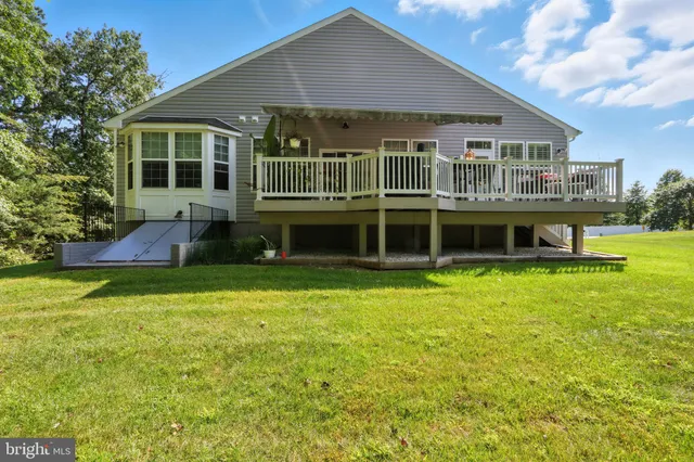 a picture of a bathroom with a shower