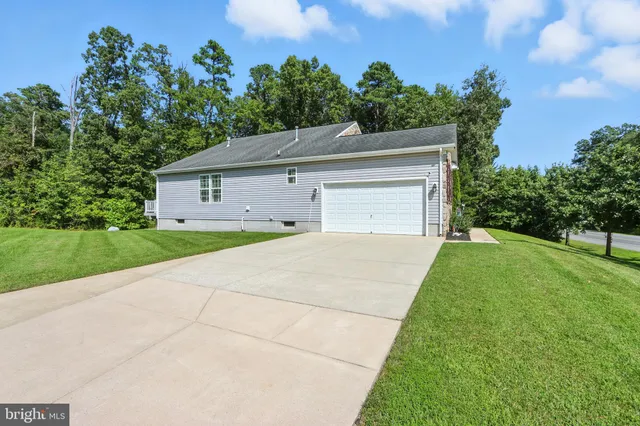 a picture of a bathroom with a shower