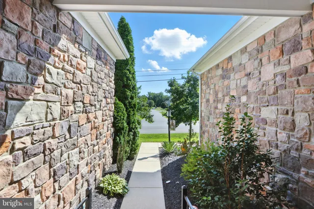 a view of a pathway with a building in the background