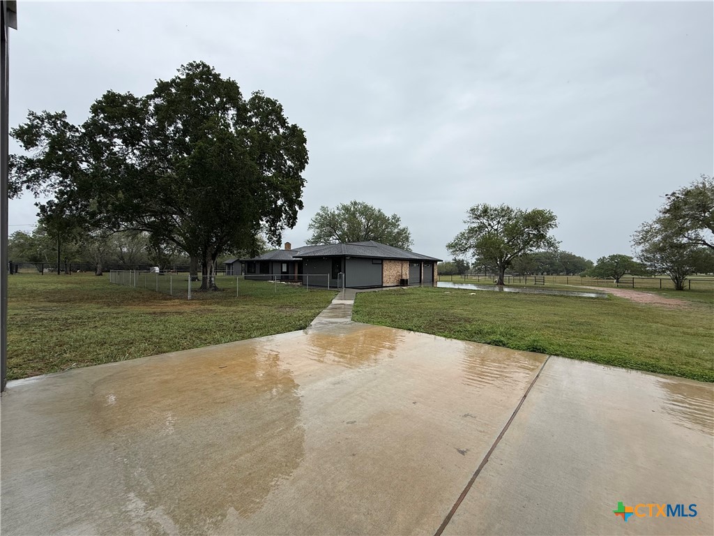 2243 Old Goliad Road Victoria, TX 77905 - Photo 2 of 47 a view of a park with large trees