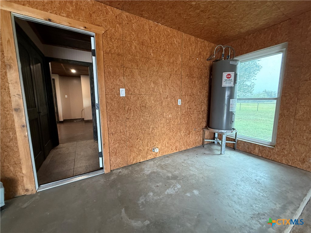2243 Old Goliad Road Victoria, TX 77905 - Photo 39 of 47 an empty room with windows