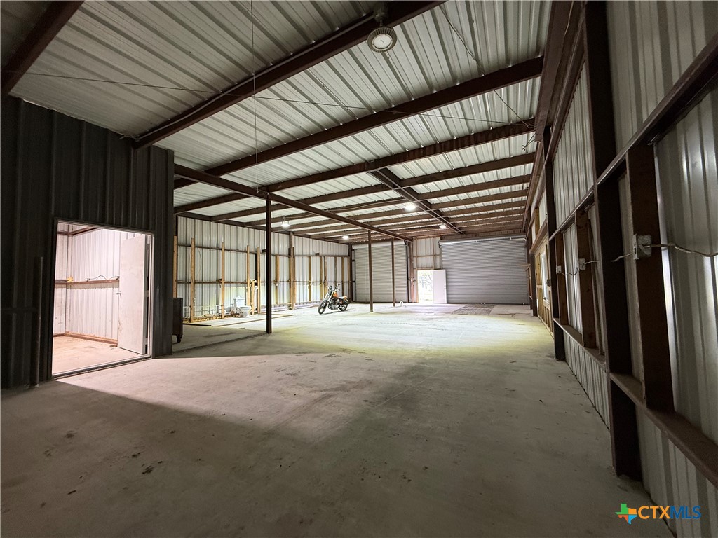2243 Old Goliad Road Victoria, TX 77905 - Photo 42 of 47 a view of large room with wooden floor