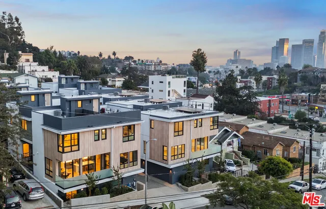 a view of a city with tall buildings