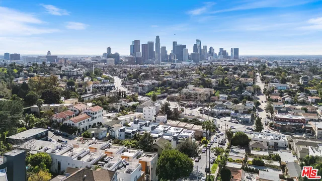 an aerial view of a city with lots of residential buildings