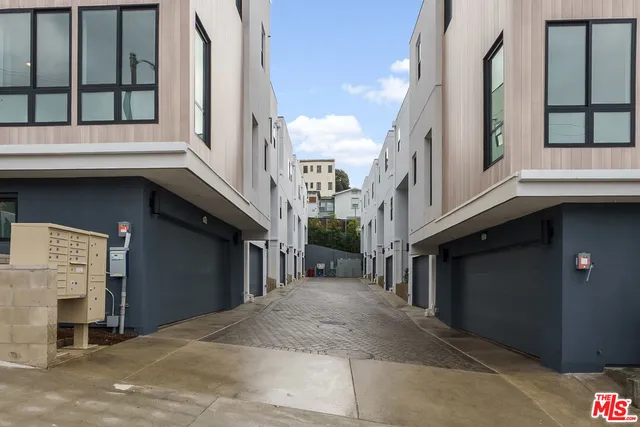 a front view of a building with street view