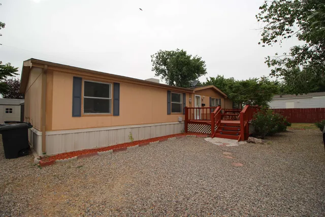 a house with trees in front of it