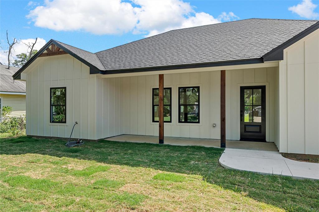 3320 North 27th Street Waco, TX 76708 - Photo 34 of 38 a front view of a house with garden