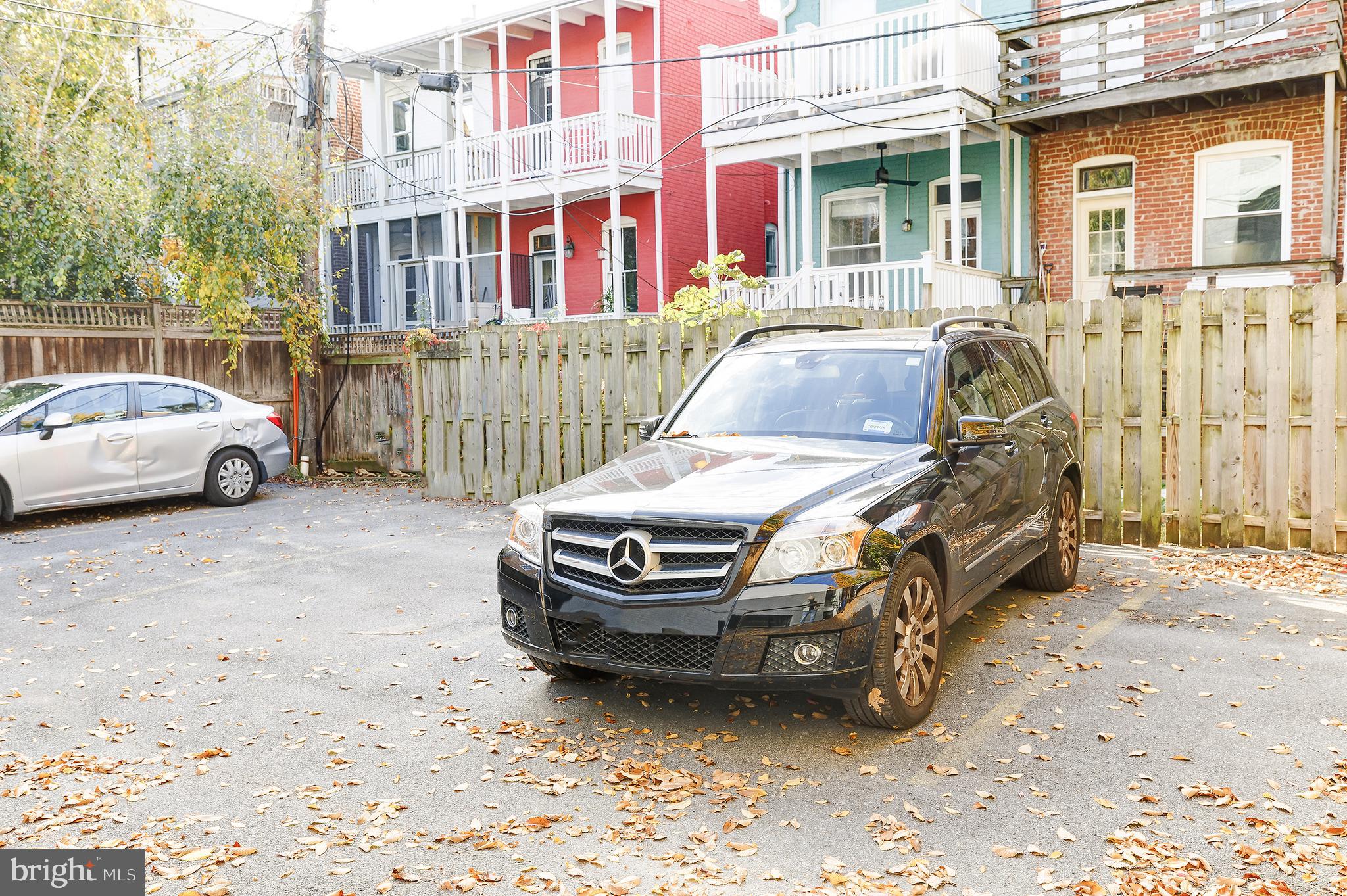 1514 Newton Street Northwest, Unit 301 Washington, DC 20010 - Photo 29 of 30 a car parked in front of a house