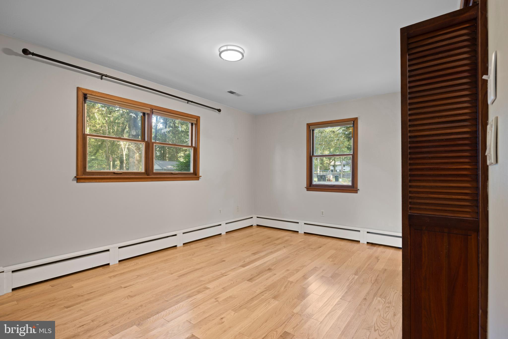108 Primrose Road Chestertown, MD 21620 - Photo 21 of 49 wooden floor in an empty room with a window
