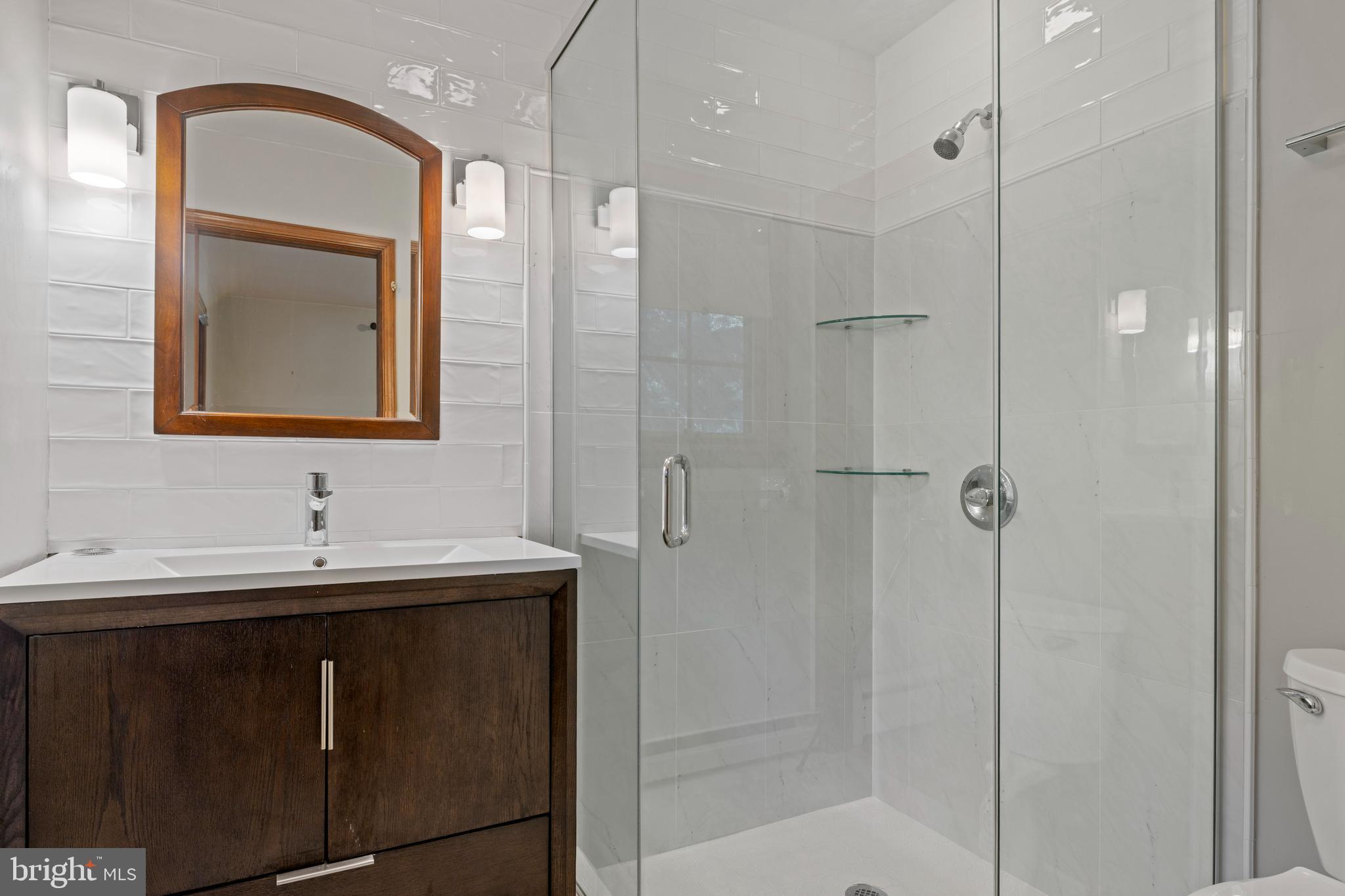 108 Primrose Road Chestertown, MD 21620 - Photo 24 of 49 a bathroom with a sink and a mirror