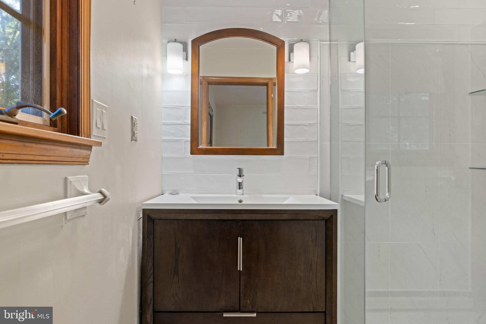 108 Primrose Road Chestertown, MD 21620 - Photo 25 of 49 a bathroom with a sink and a mirror