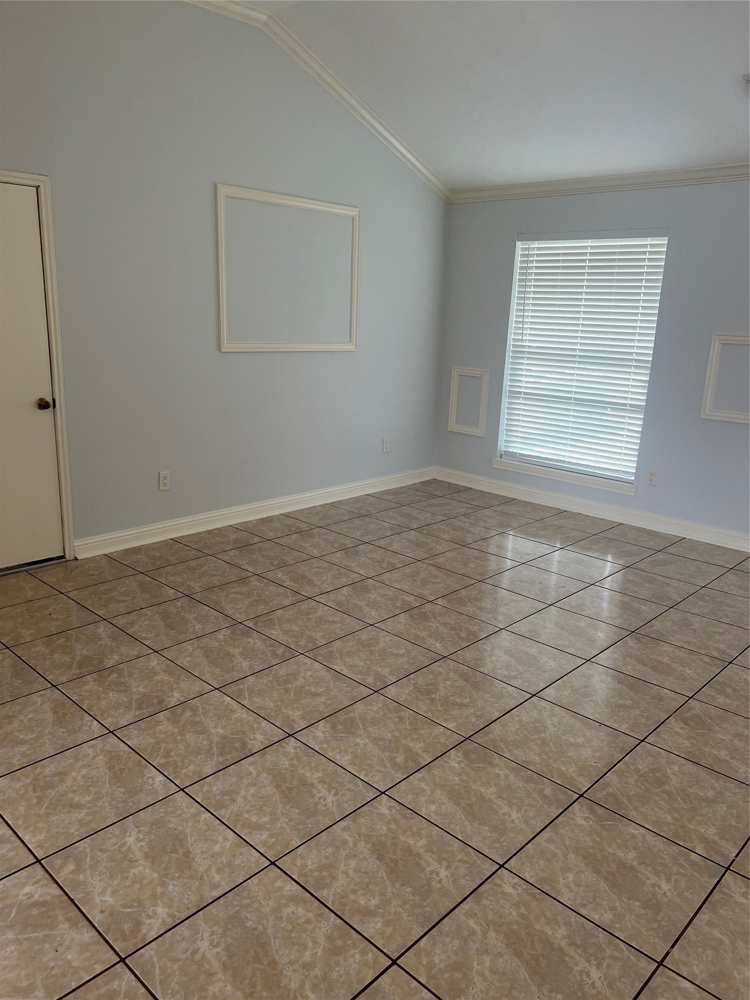 15303 Riverside Grove Drive Houston, TX 77083 - Photo 5 of 10 a view of an empty room and window