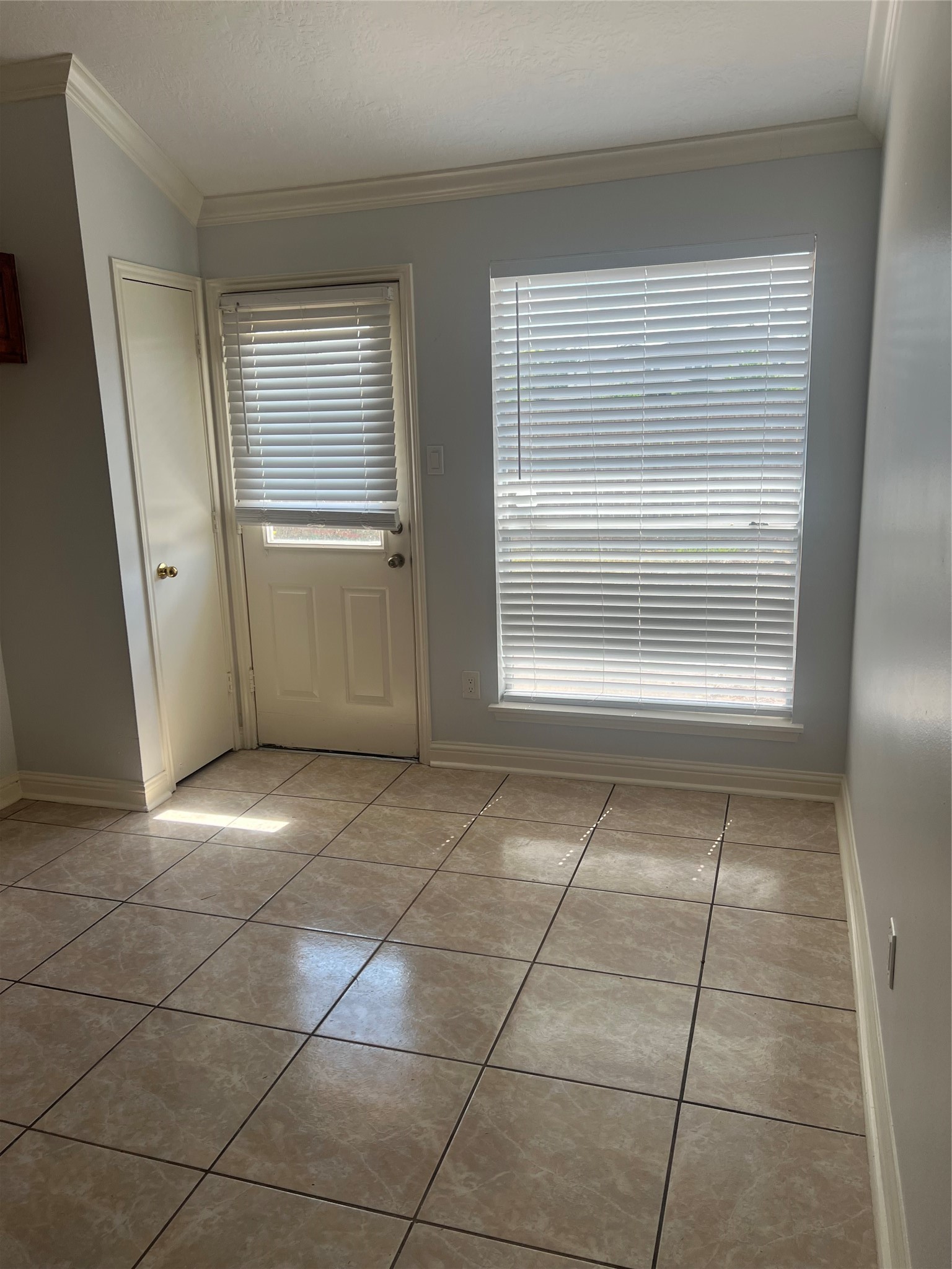 15303 Riverside Grove Drive Houston, TX 77083 - Photo 6 of 10 a view of a utility room and empty room
