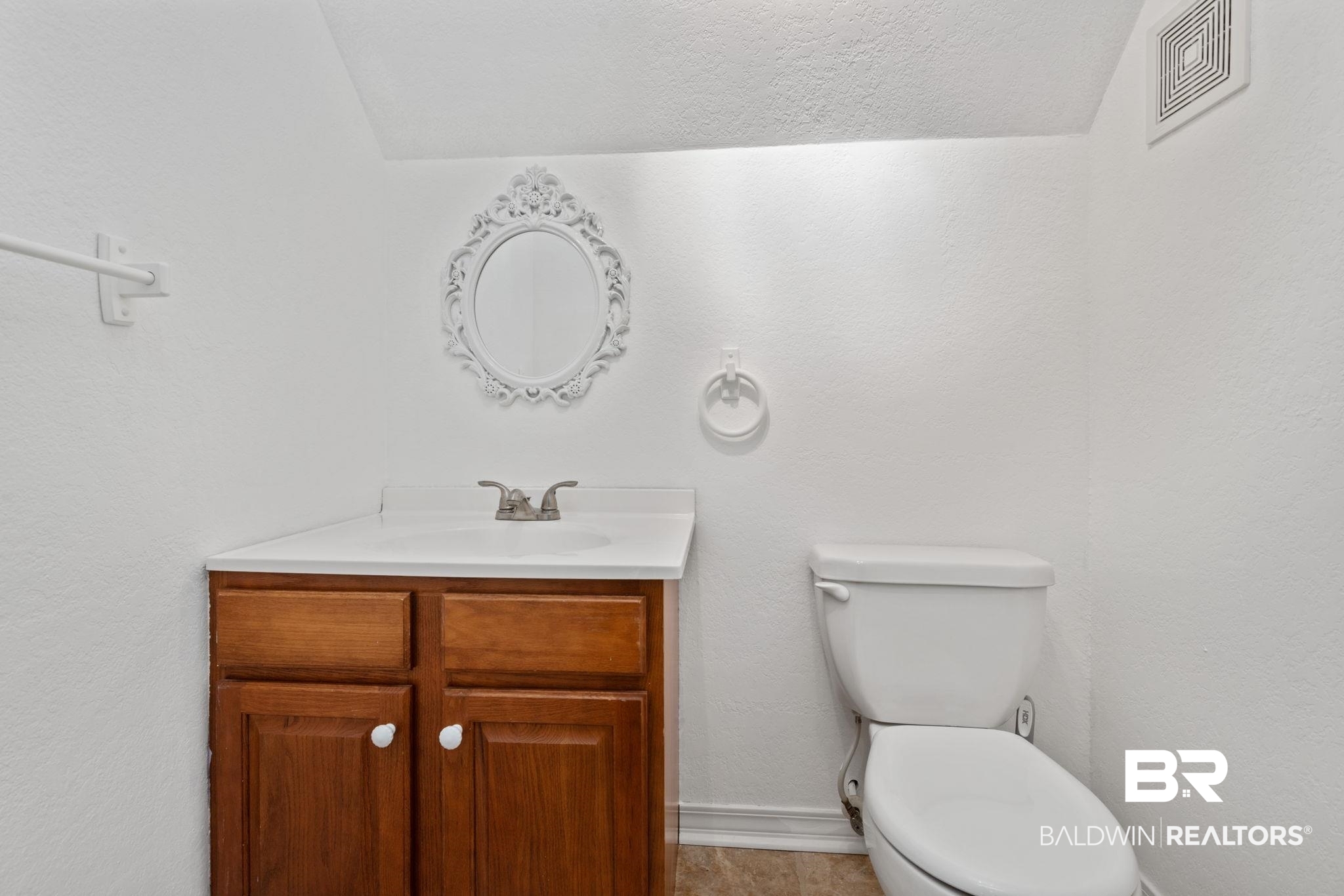4771 Pecan Ridge East Mobile, AL 36619 - Photo 47 of 48 Half bath featuring vanity and a textured wall