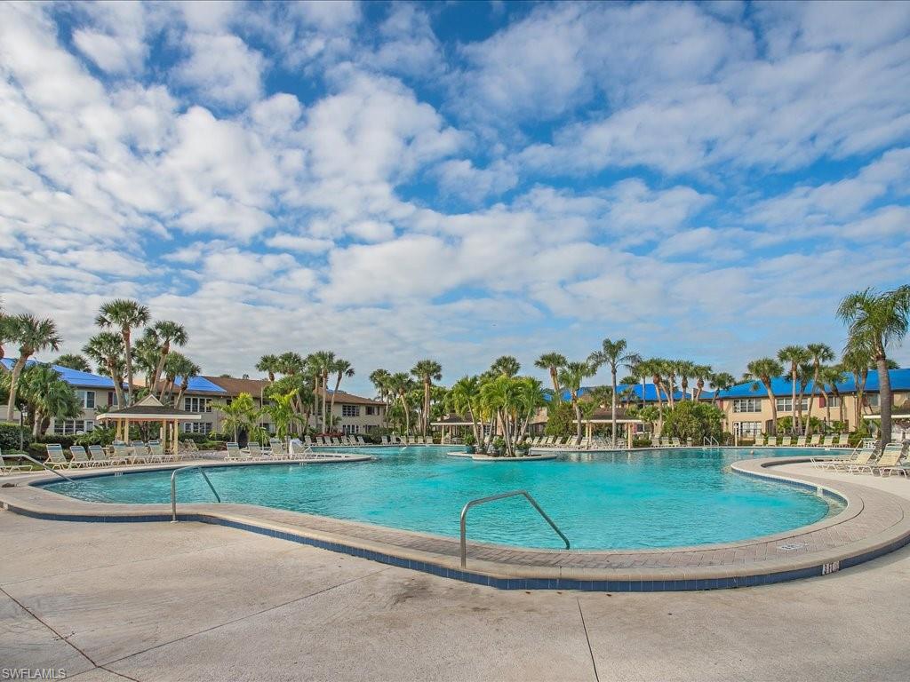 4070 Looking Glass Lane, Unit 3106 Naples, FL 34112 - Photo 28 of 29 a view of a basket ball ground in front of house