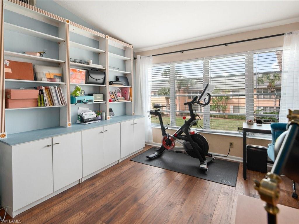 4070 Looking Glass Lane, Unit 3106 Naples, FL 34112 - Photo 8 of 29 a view of a workspace with furniture and a window