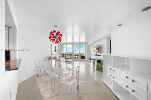 a view of a dining room with furniture
