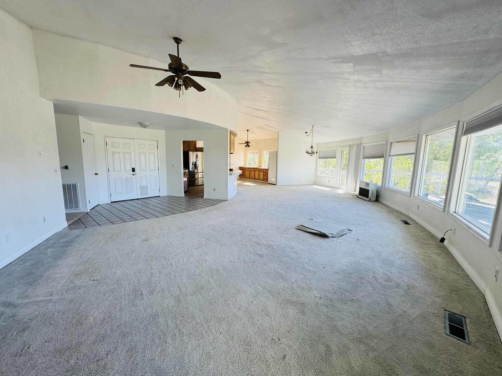 21283 Lela Lane Redding, CA 96003 - Photo 15 of 23 a view of a livingroom with a ceiling fan and window