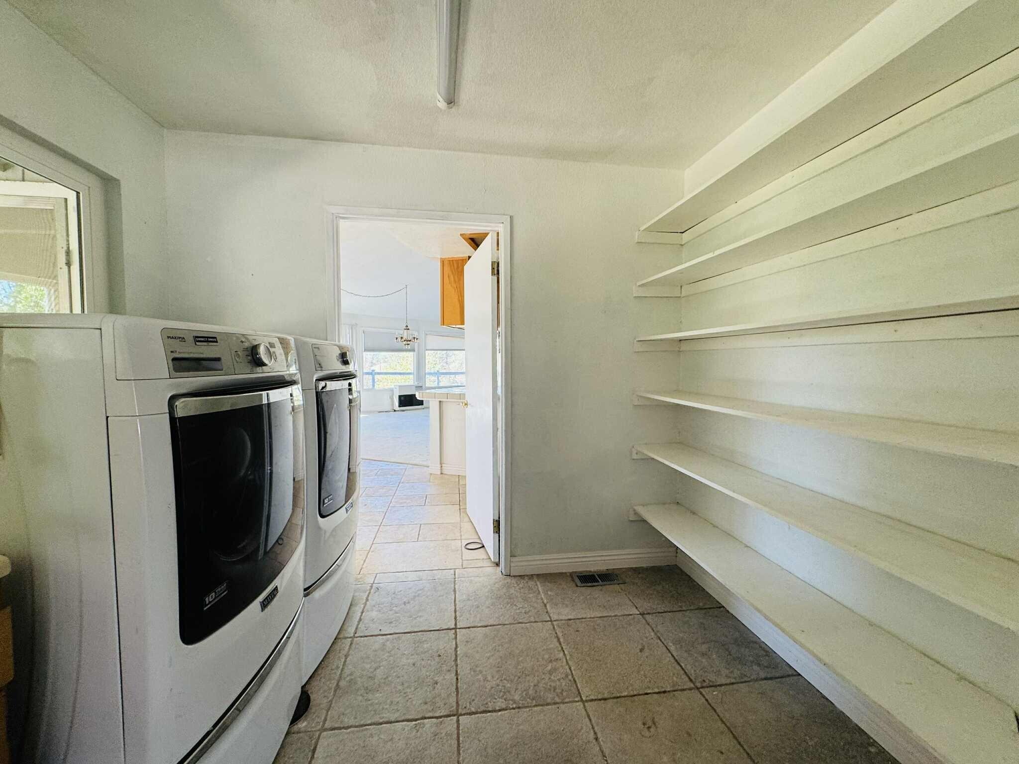 21283 Lela Lane Redding, CA 96003 - Photo 16 of 23 a kitchen with a stove top oven and cabinets