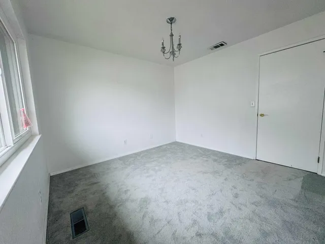 a view of a backyard with a slide