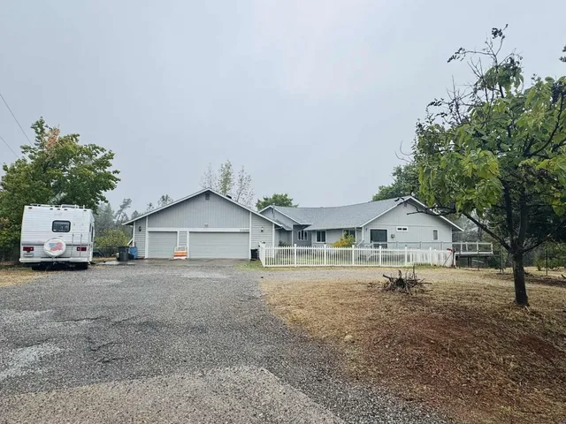 a view of large house with a outdoor space