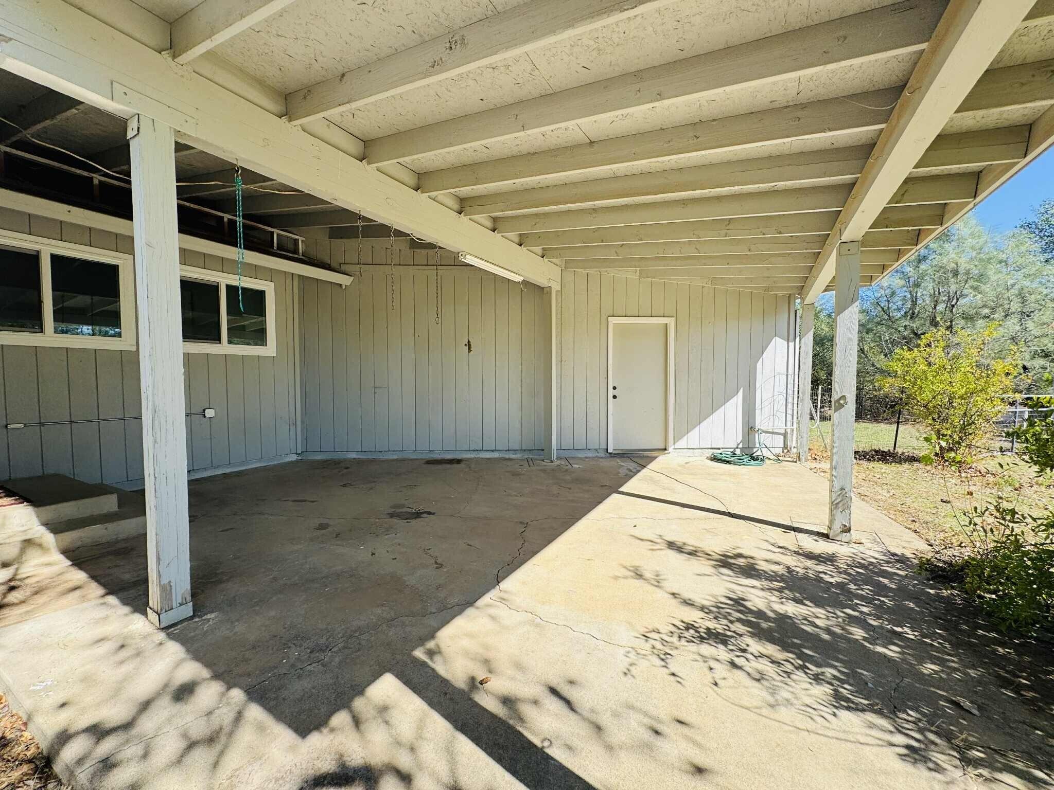 21283 Lela Lane Redding, CA 96003 - Photo 4 of 23 a view of a back yard of the house