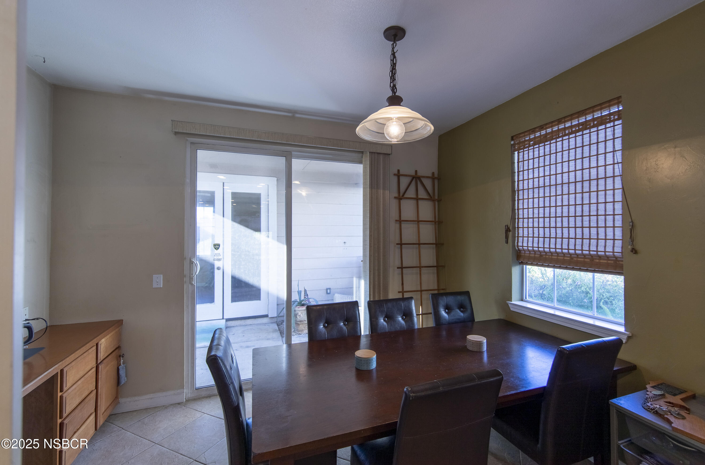 2324 Carrizo Lompoc, CA 93436 - Photo 14 of 62 a view of a dining room with furniture window and wooden floor